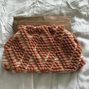 Textured coral/rust Woven Clutch